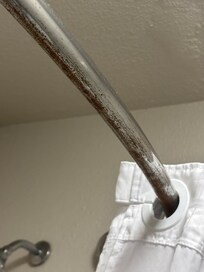 Rusty shower curtain rod