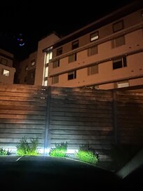 Parking area facing towards outdoor courtyard
