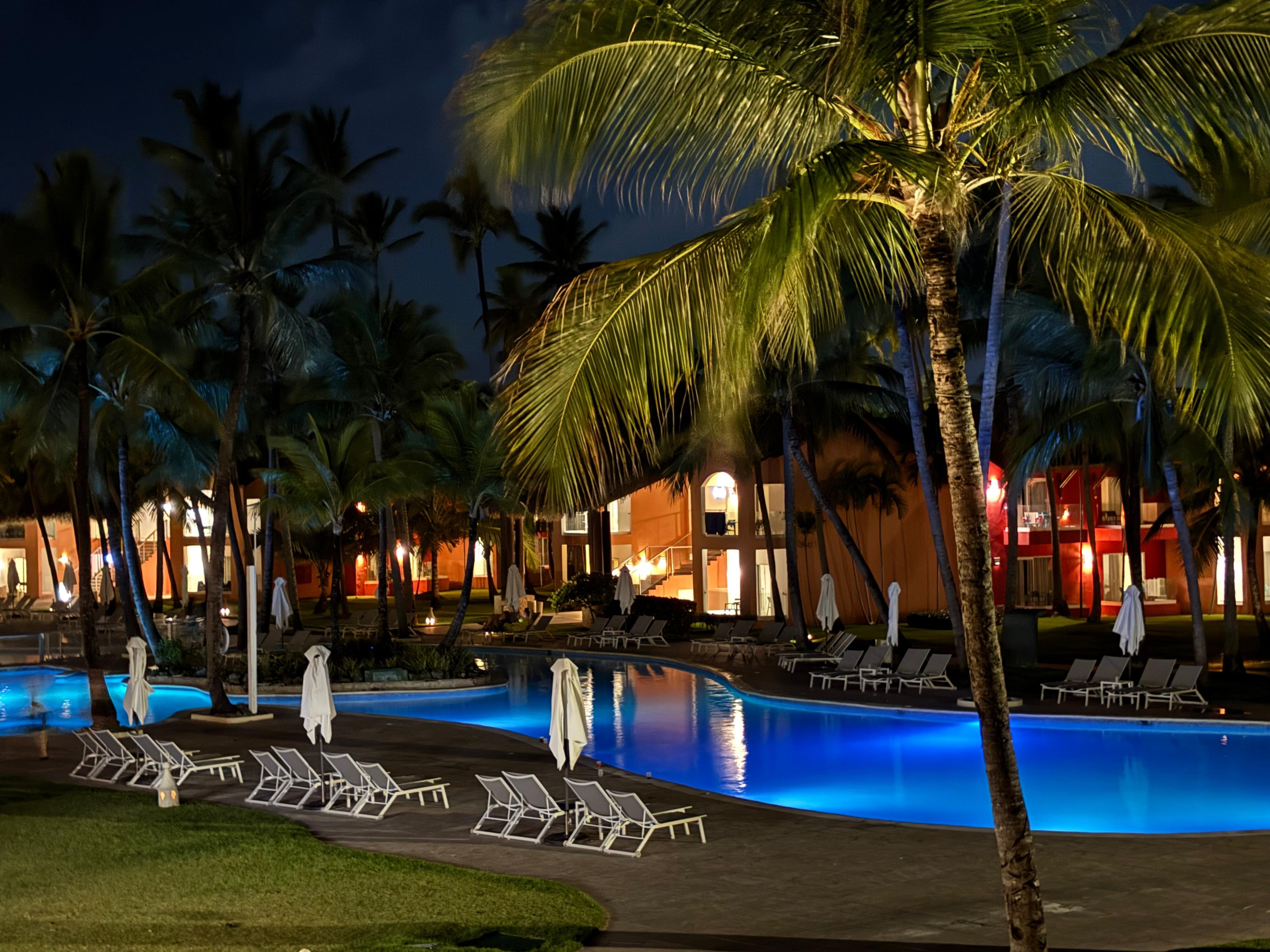 One of the pool areas at night.