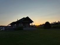 Sunset behind cottage