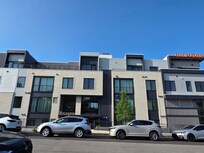 Shows roof top patio (there is underground parking available)