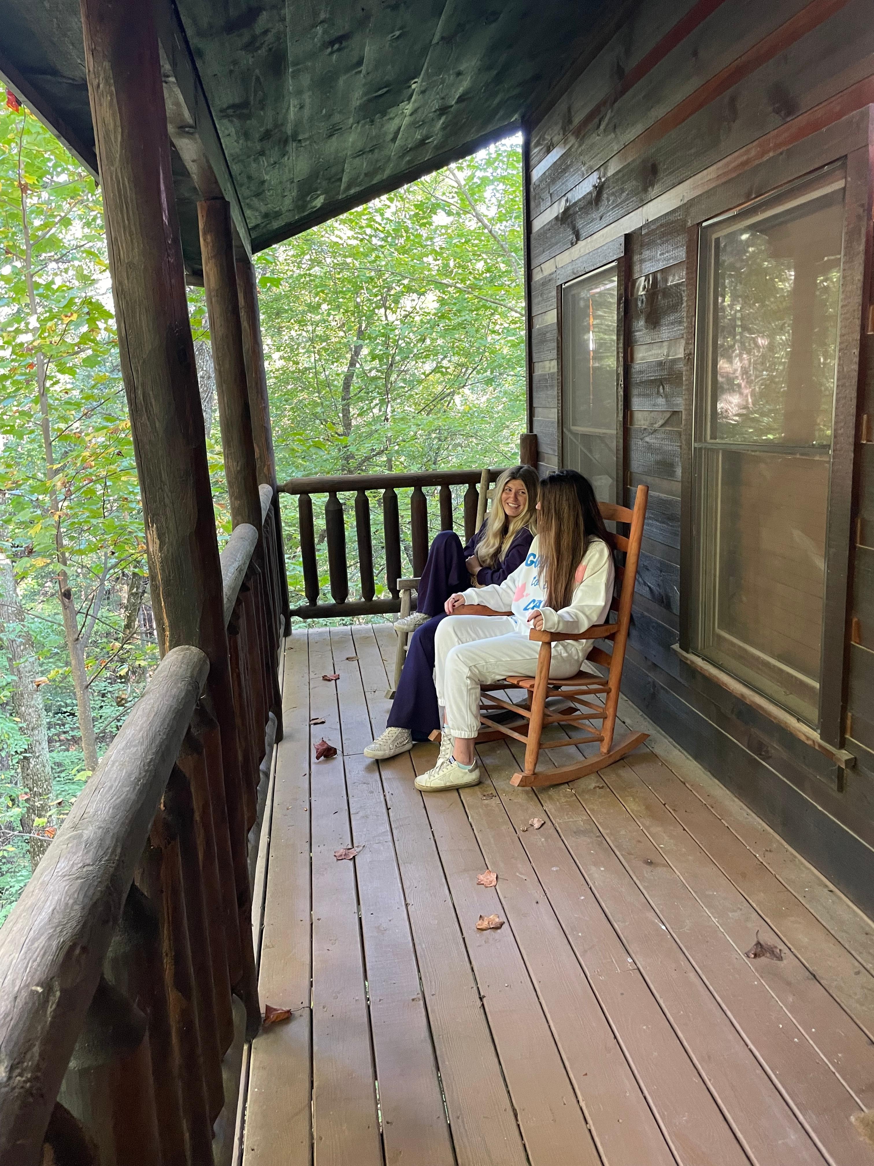 Daughters enjoying the view from the porch