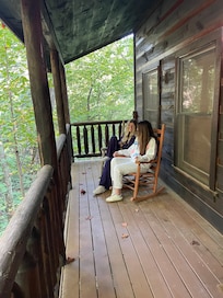 Daughters enjoying the view from the porch