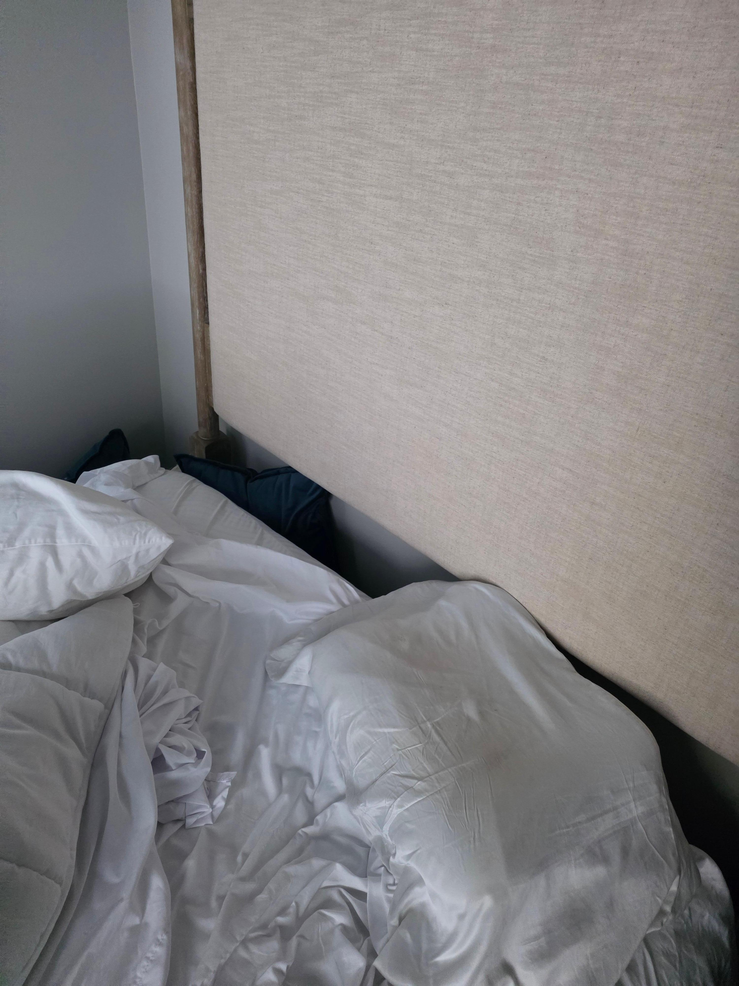 Mattress with no box spring well below headboard 