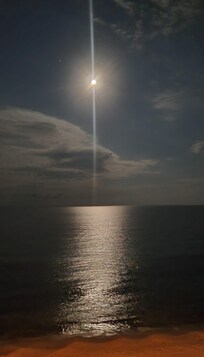 The view of the moon over the ocean was even better.