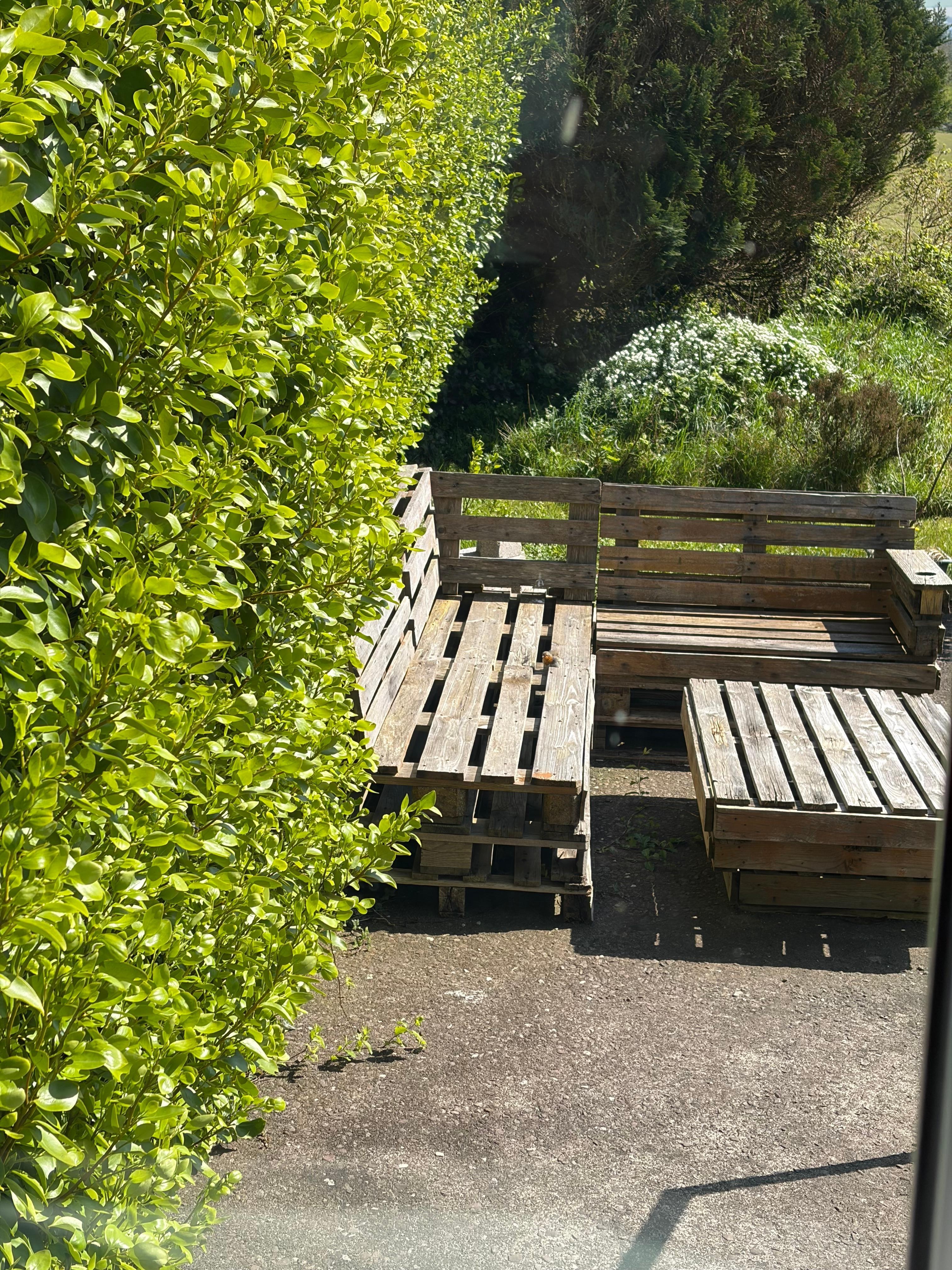 Charming little seating area for outdoor relaxation.
