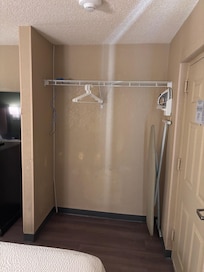 one hanger, no extra blankets, pillows, nothing