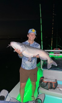 20lb blue cat caught on pole the first day . On boat