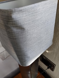 The bashed up lamp that arrived when we requested a bedside light!