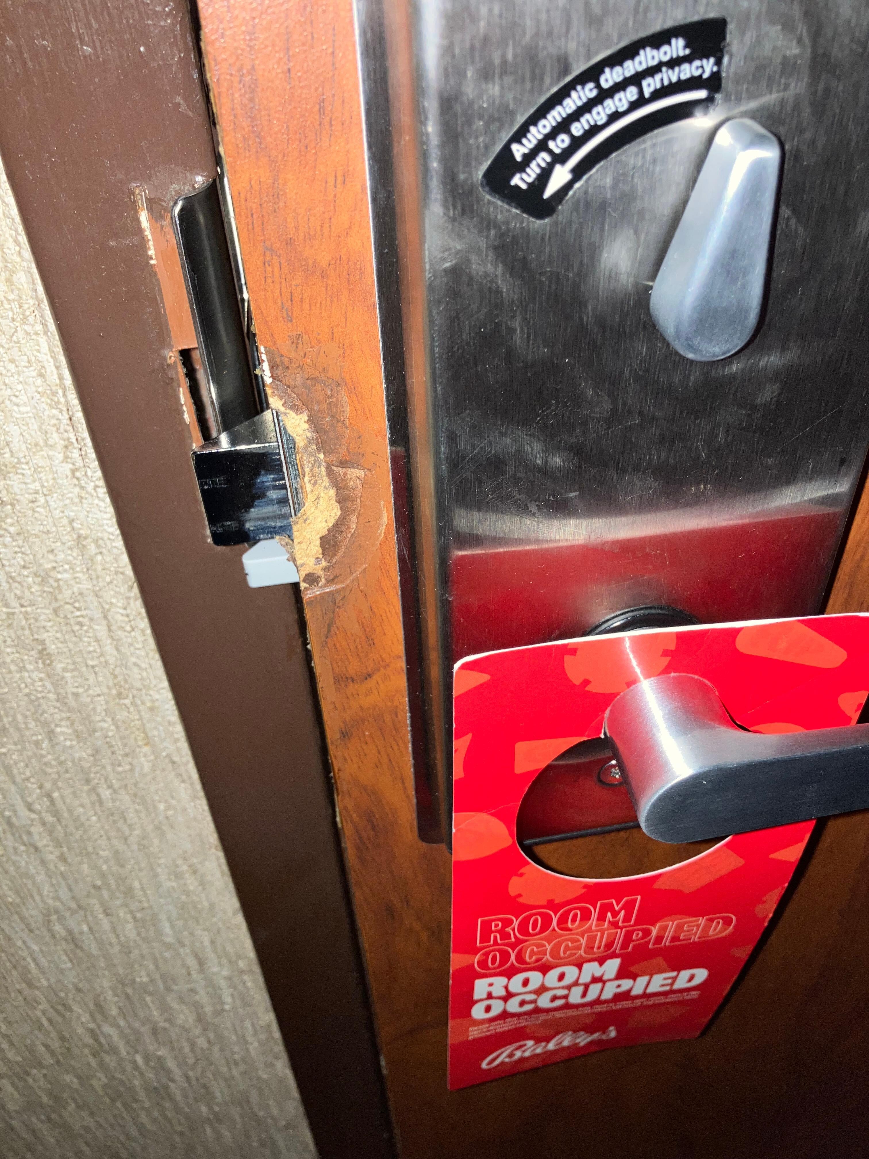 Inside
Of door. Someone obviously tried to or did break in not safe.