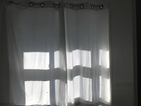 Light coming in through children’s room even worse because of white curtain and no blinds