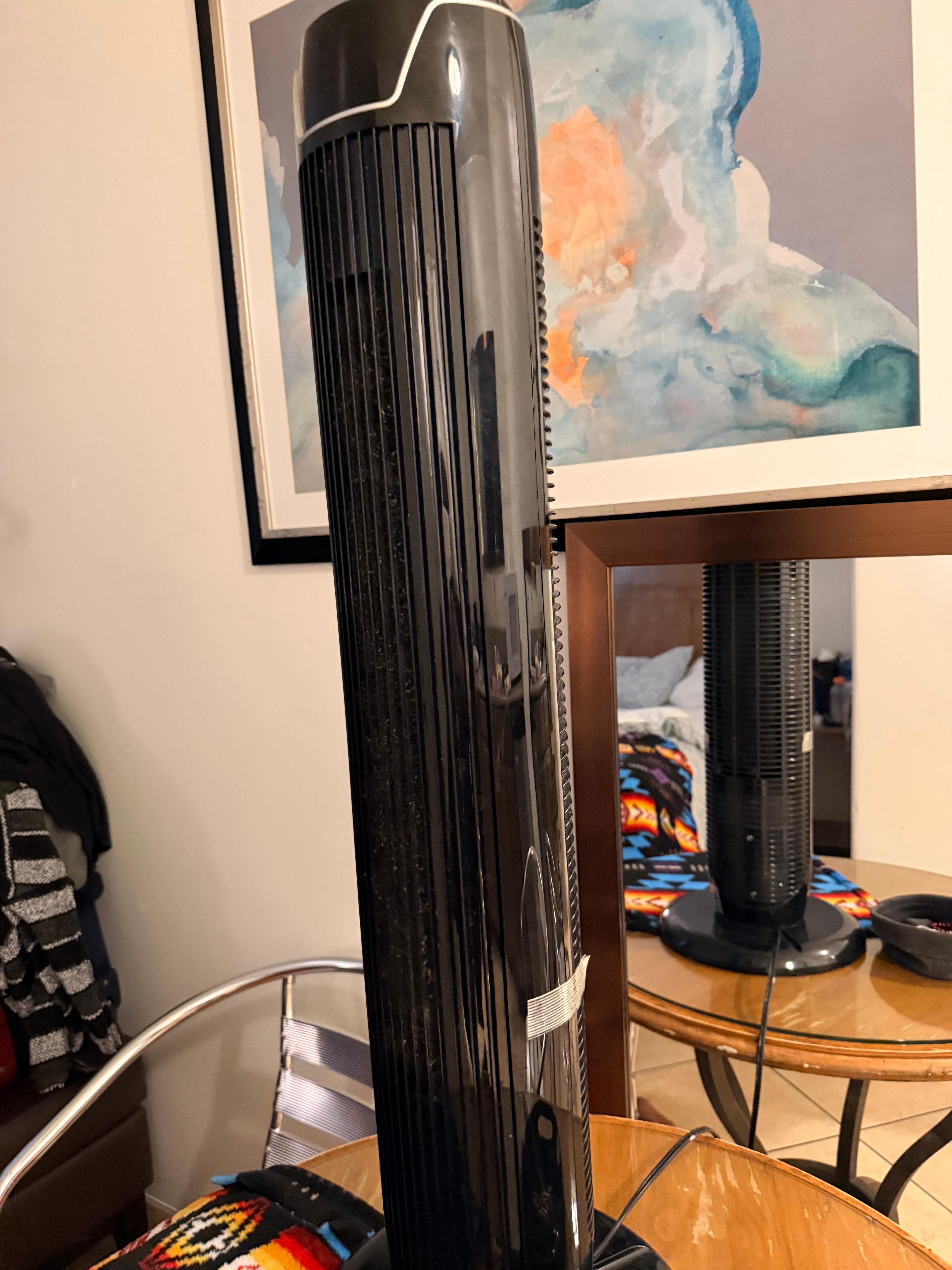 Only air in the room, fan placed on a table 