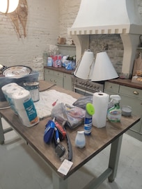 Junk piled in the kitchen and the stove out of commission.
