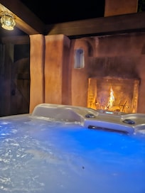 Second fireplace area with hottub.