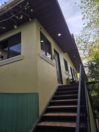 View of the rental upstairs, with laundry area below