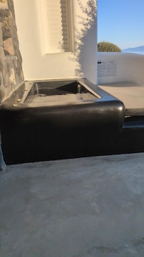 Jacuzzi sur le patio de la chambre.