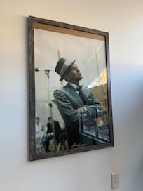 Poster in the kitchen that has slipped within its frame. Indicative.