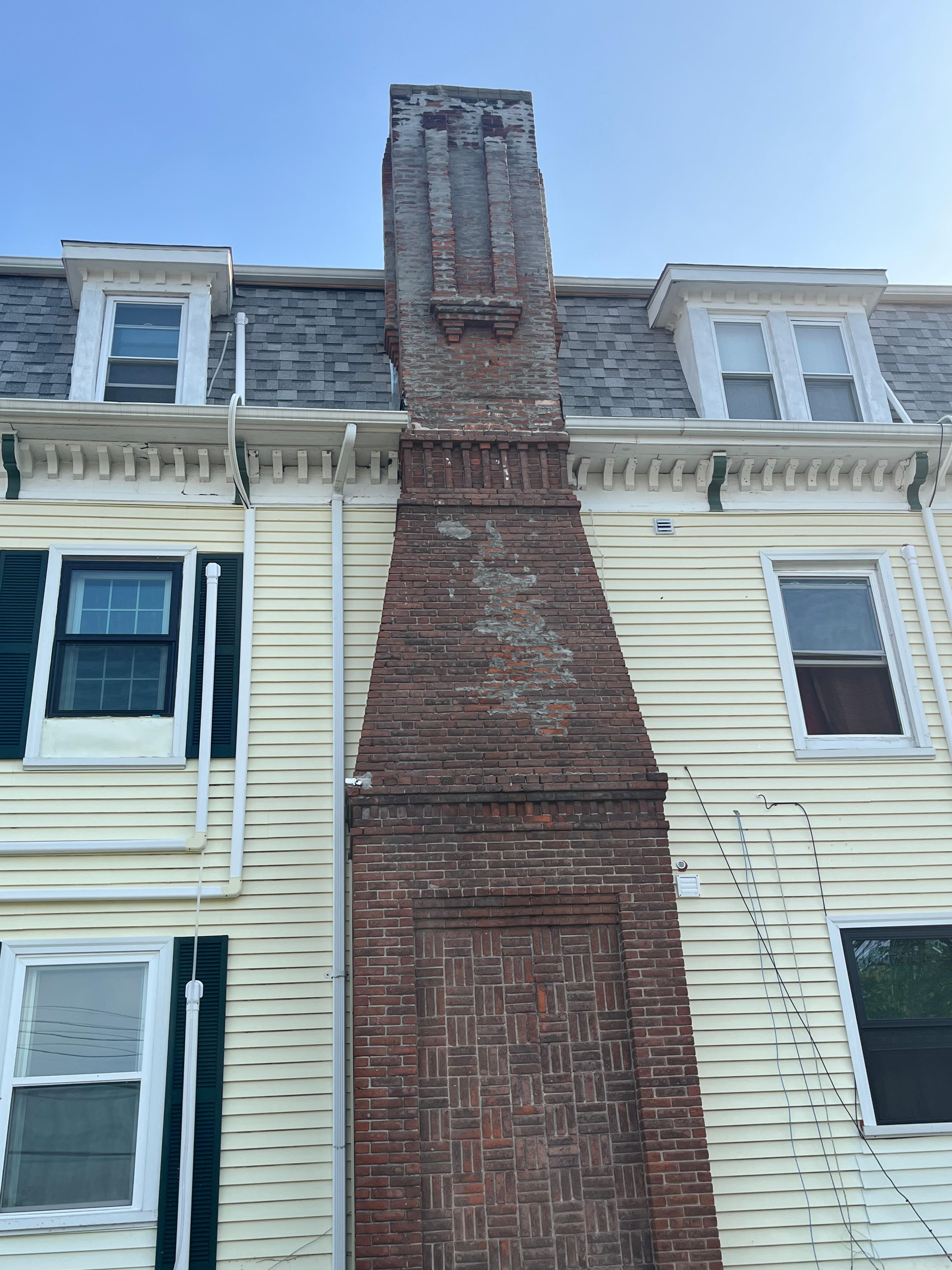 Property is a 20 th c  3 story former home turned boarding house 
The historic district is under total restoration and is safe. There is a city style park square nearby 