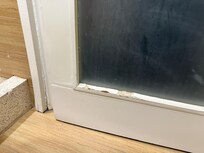 Peeling paint and bathroom door that would not shut.