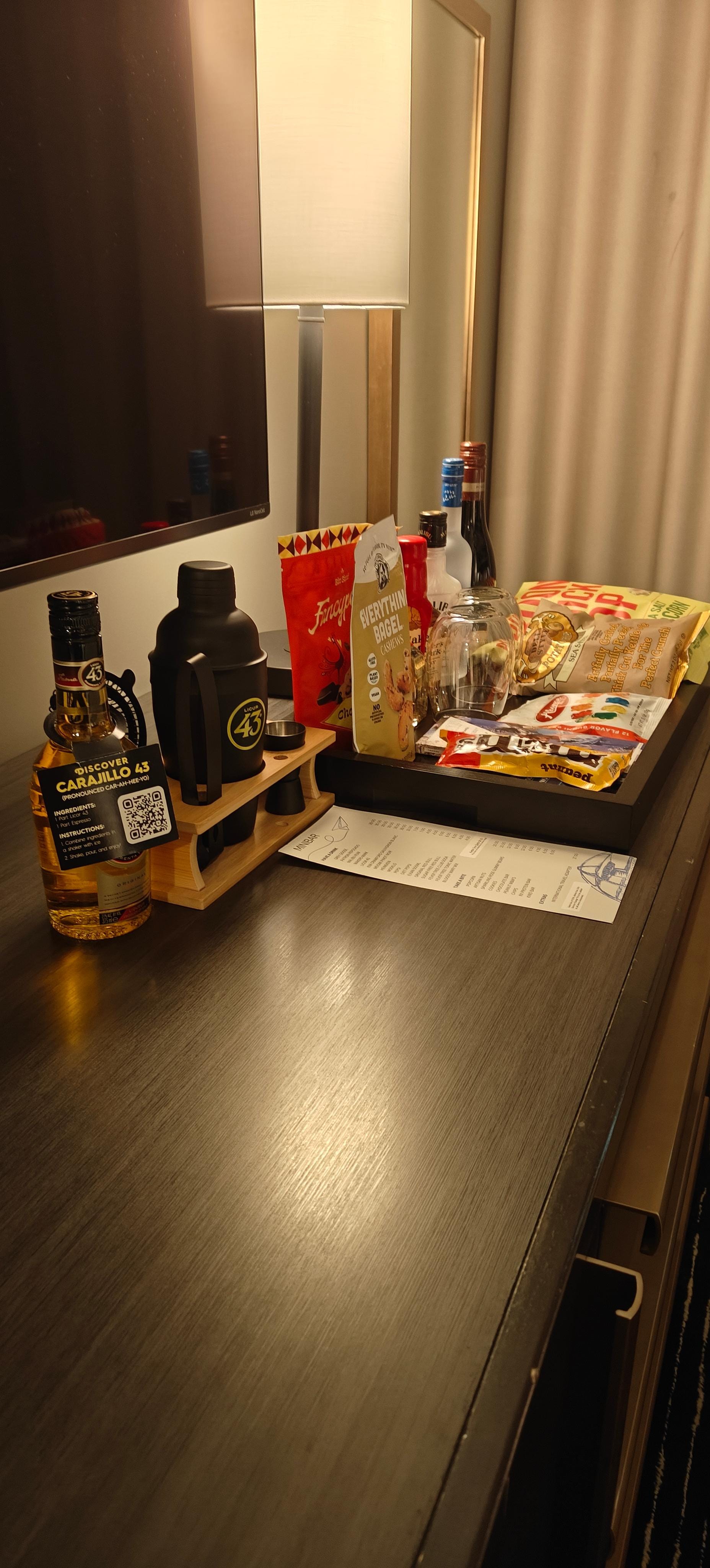 Snacks and alcoholic beverages in the room. Very expensive. 