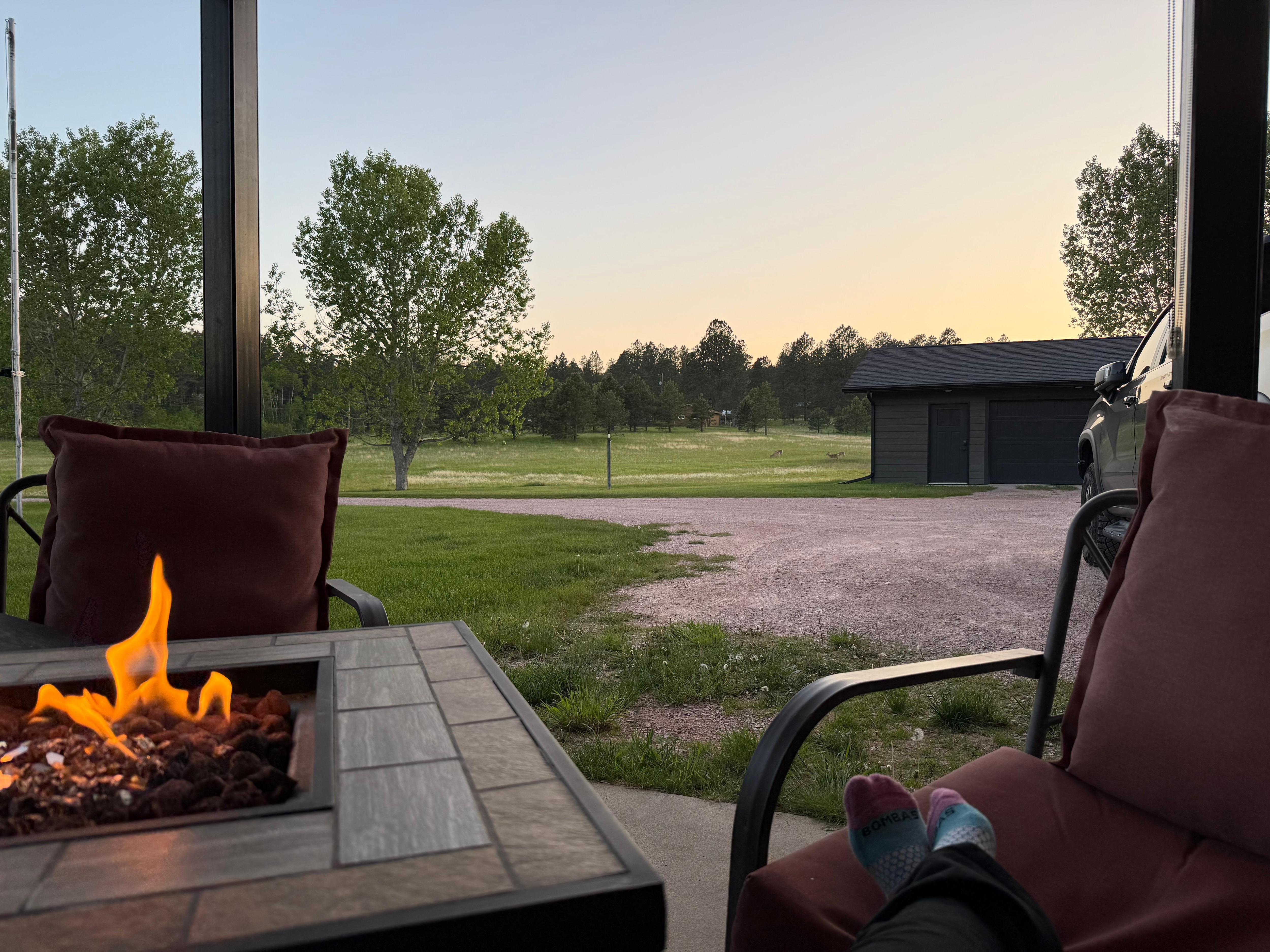 Fire pit on the patio and parking/driveway