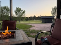 Fire pit on the patio and parking/driveway
