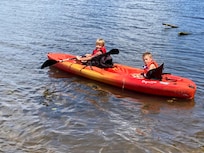 double kayak in addition to some single kayaks