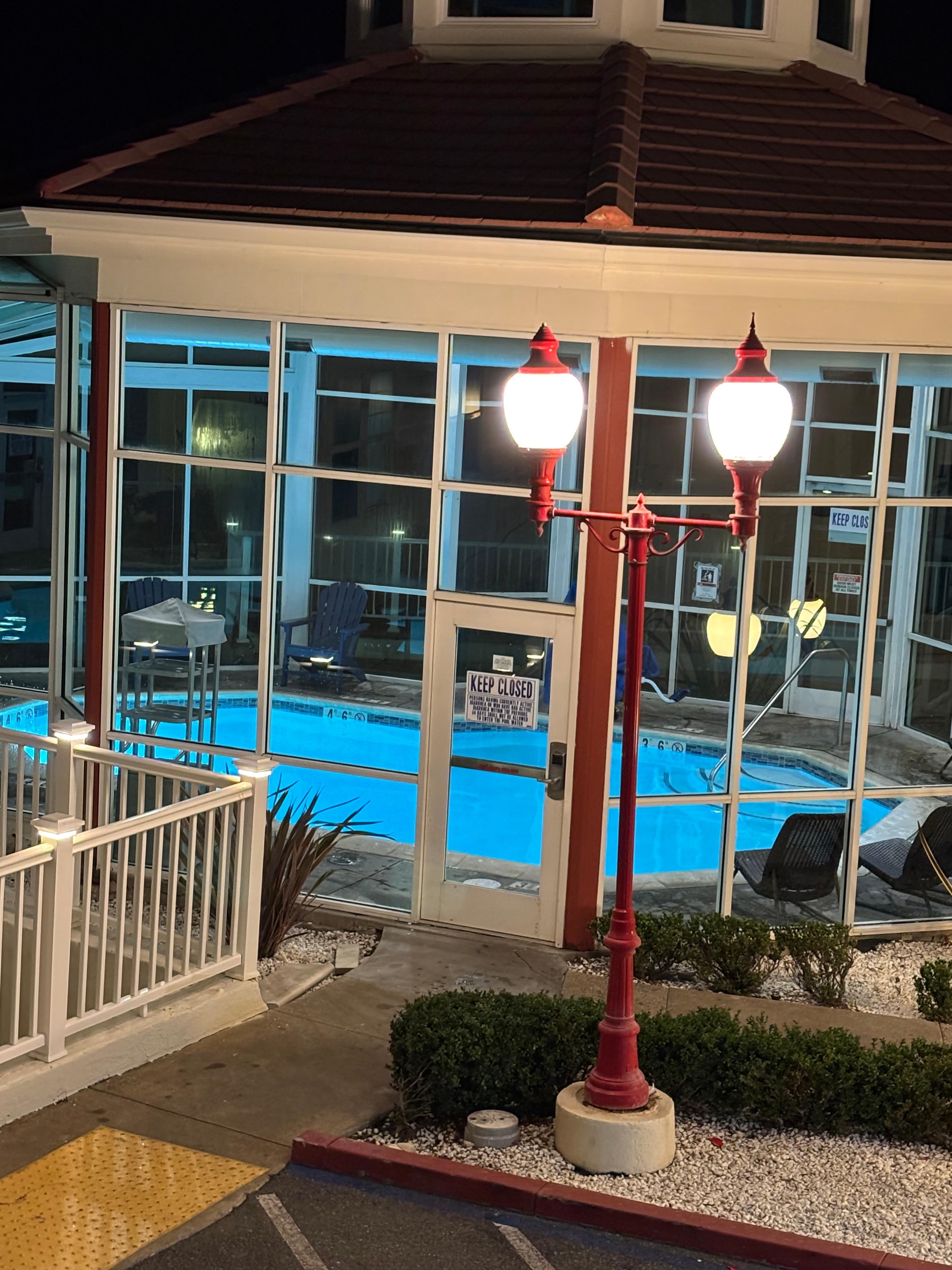 Warm indoor pool with beach view!