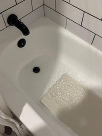Drains need to be unclogged bathtub would flood quickly after turning water on