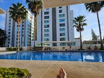 Large pool with shade covers to relax
