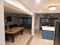 Downstairs game room. This is where we had the fridge that worked well.
