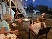 S’mores were happening at the fire pit.