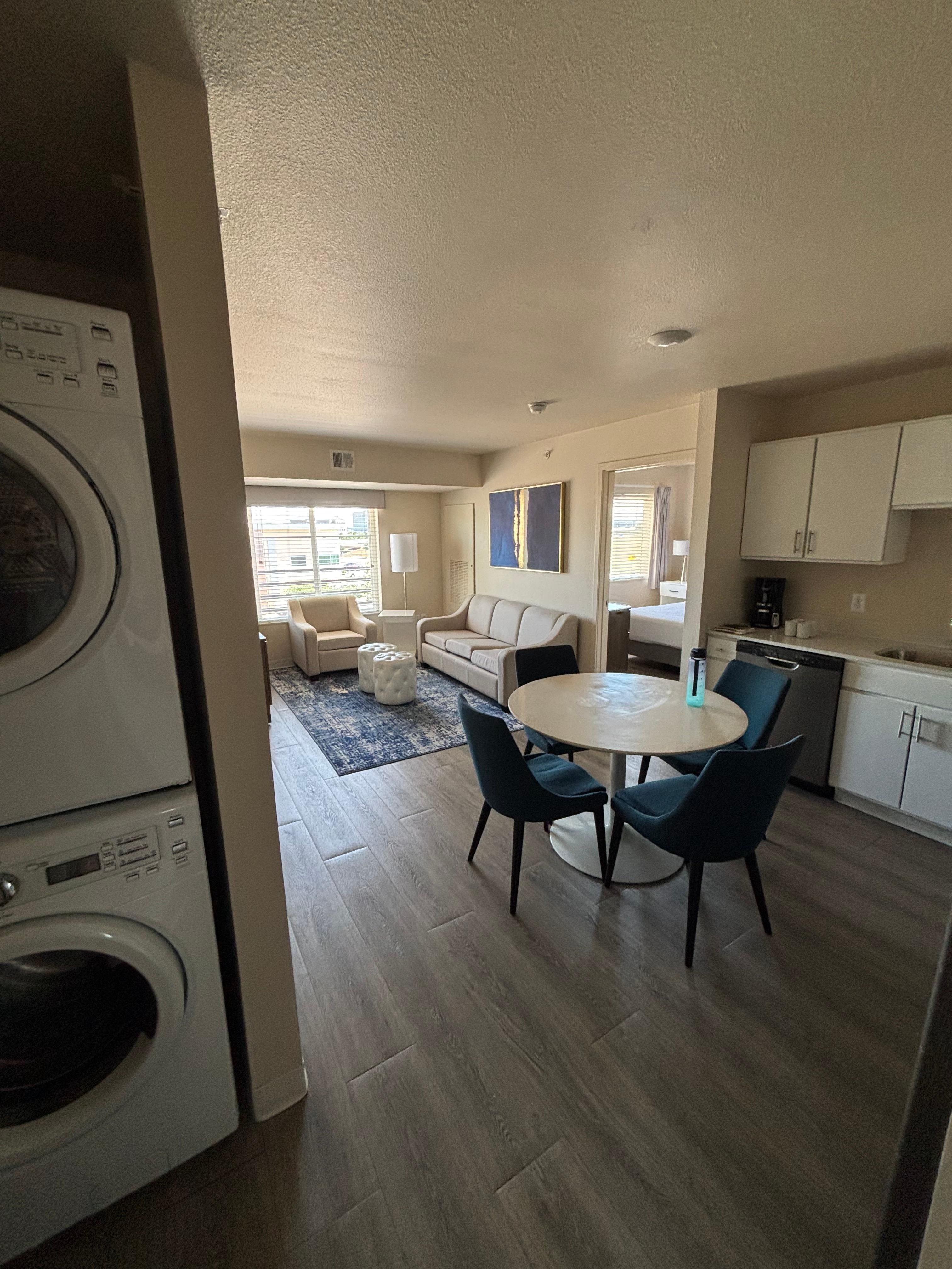 Living room with full equipped kitchen separated two bedrooms with own bathrooms 