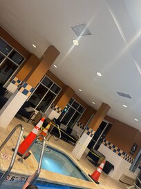 Hottub was sectioned off by orange cones and caution tape