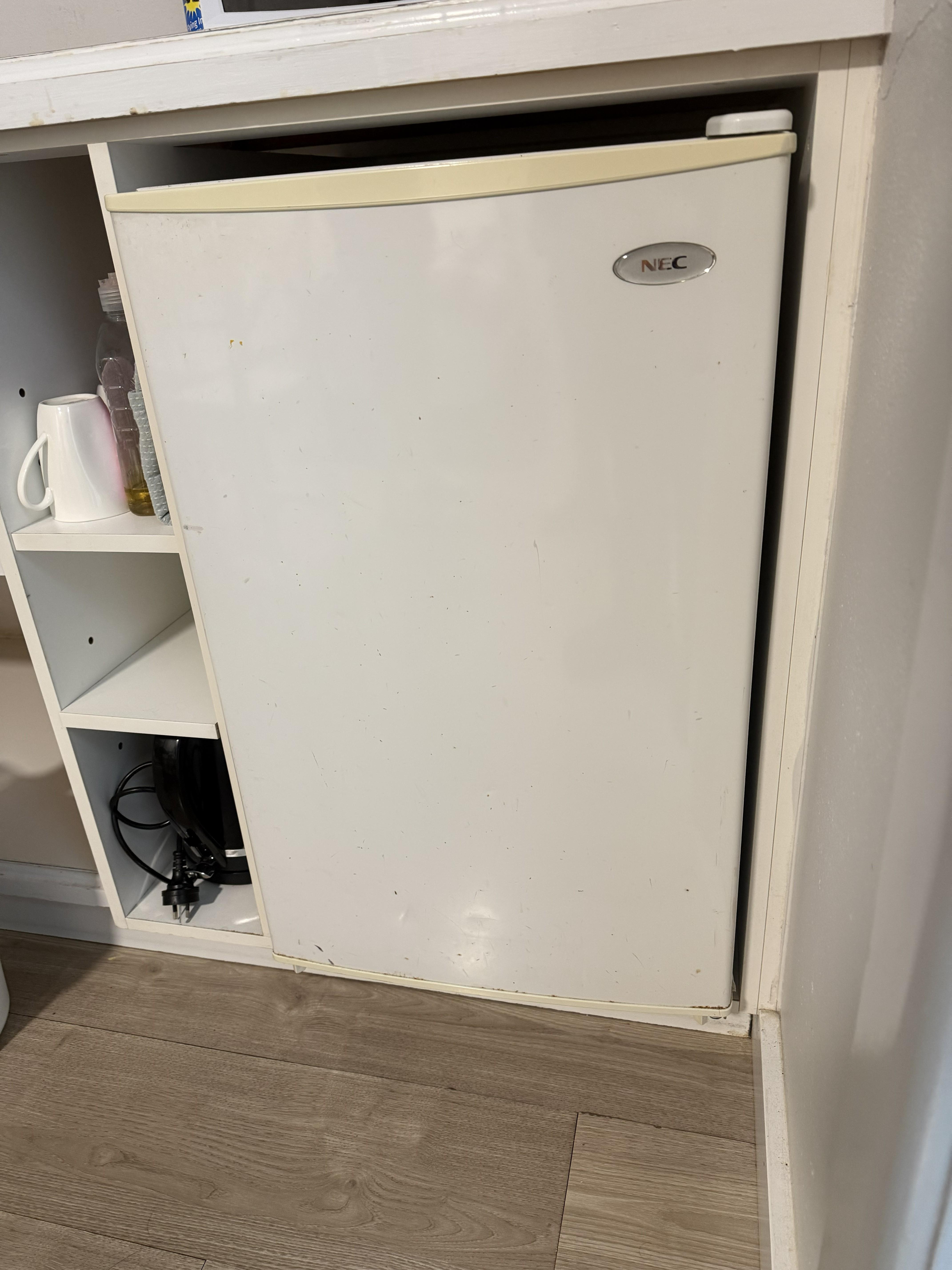 Not clean, especially bottom of the fridge as well as small food residue. 