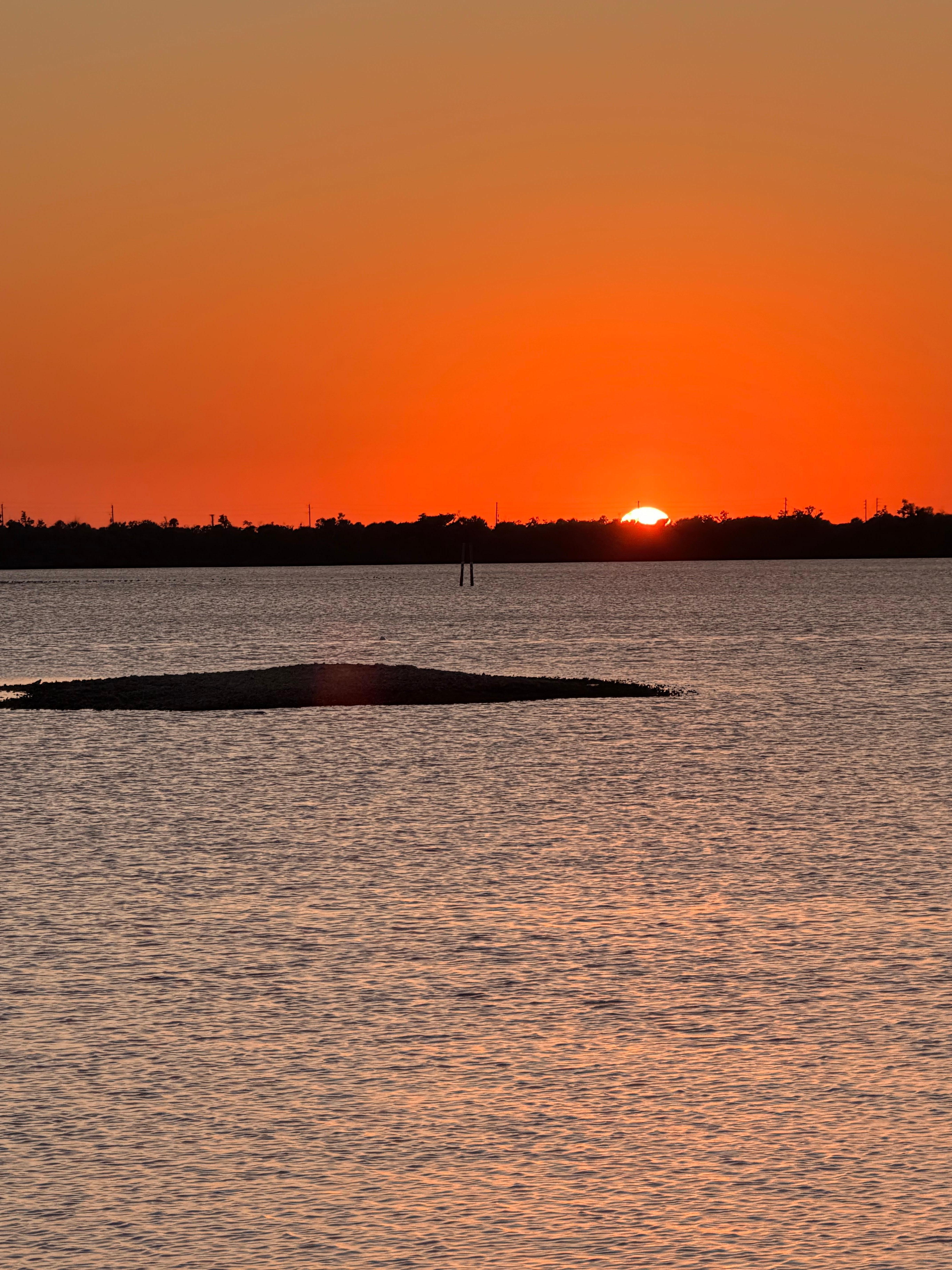 Beautiful sunset from a vacant lot on the bay just a few houses down. 