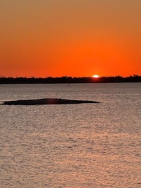 Beautiful sunset from a vacant lot on the bay just a few houses down.