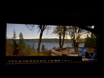 View from the inside of the house looking out in the early morning.