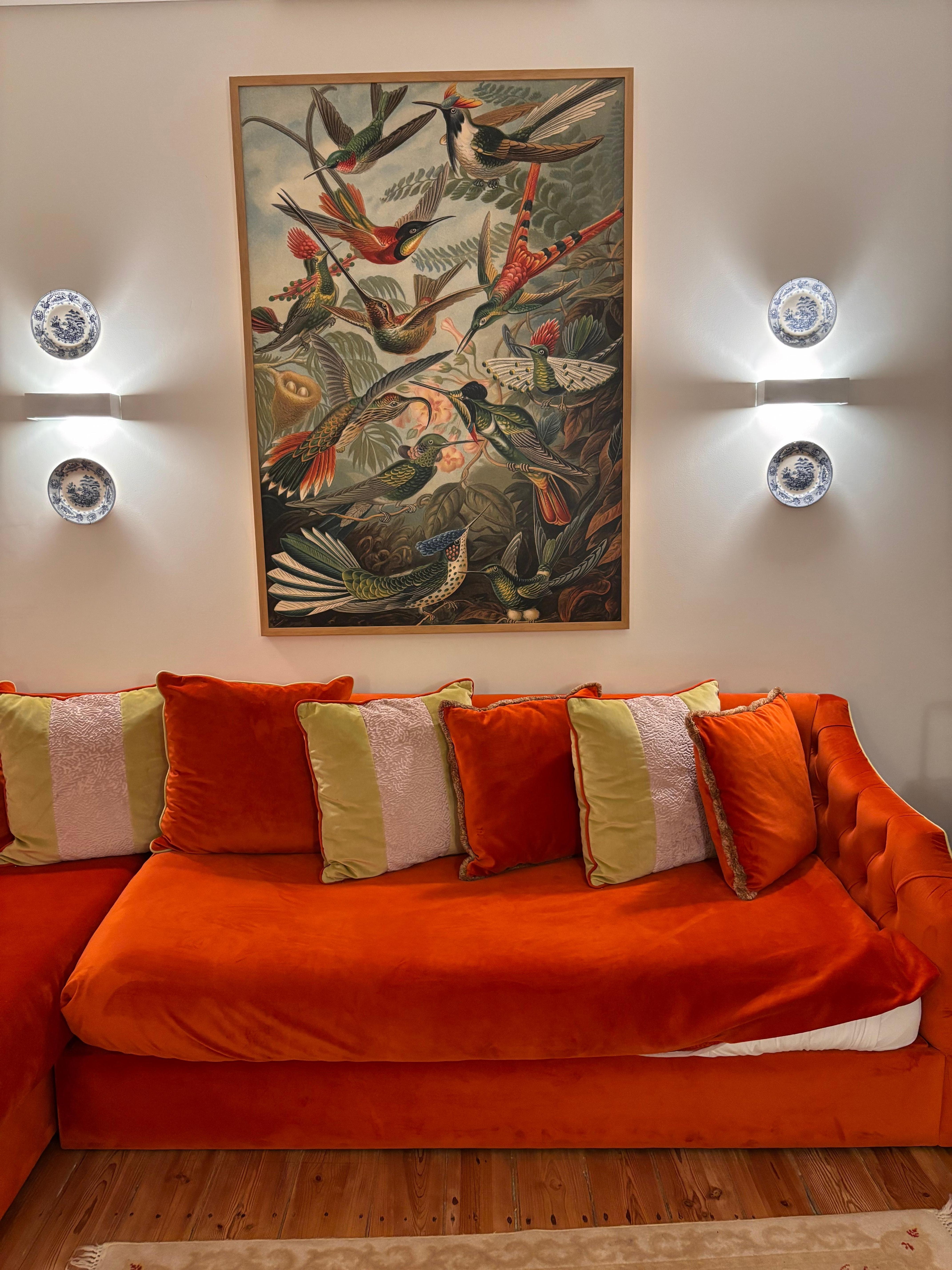 L-shaped couch converted to two single beds that were already made up. Lots of pillows for sleeping were provided as well. 