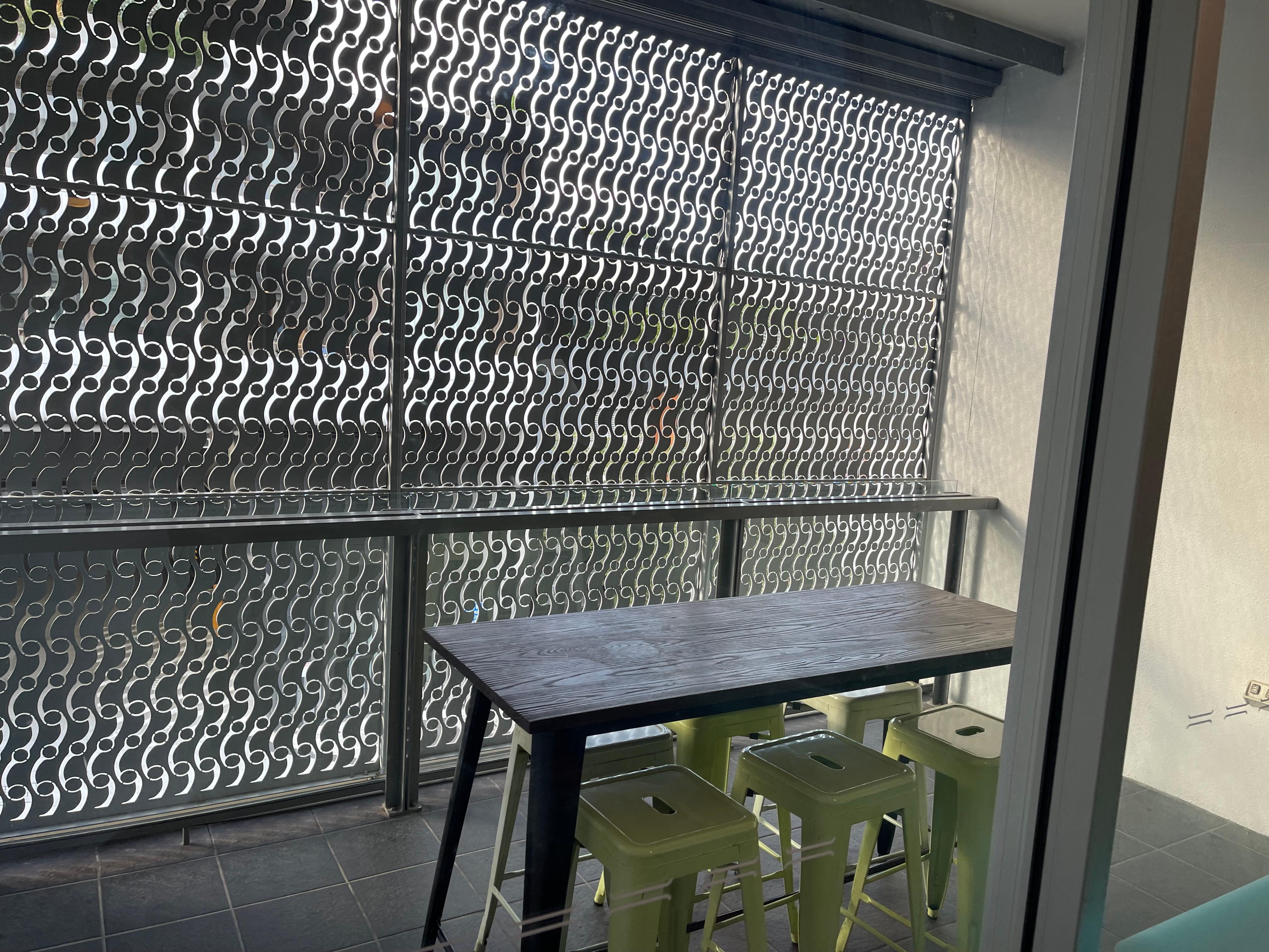 It was frustrating to have this grill covering the views - it felt claustrophobic. No chairs to sit and relax - lots of noise from bars across the road