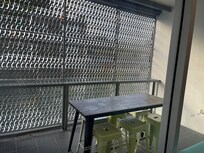 It was frustrating to have this grill covering the views - it felt claustrophobic. No chairs to sit and relax - lots of noise from bars across the road