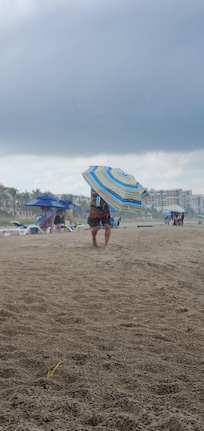 Beautiful beach, water was 86°. Had a sudden cooling rain storm. Love it!!