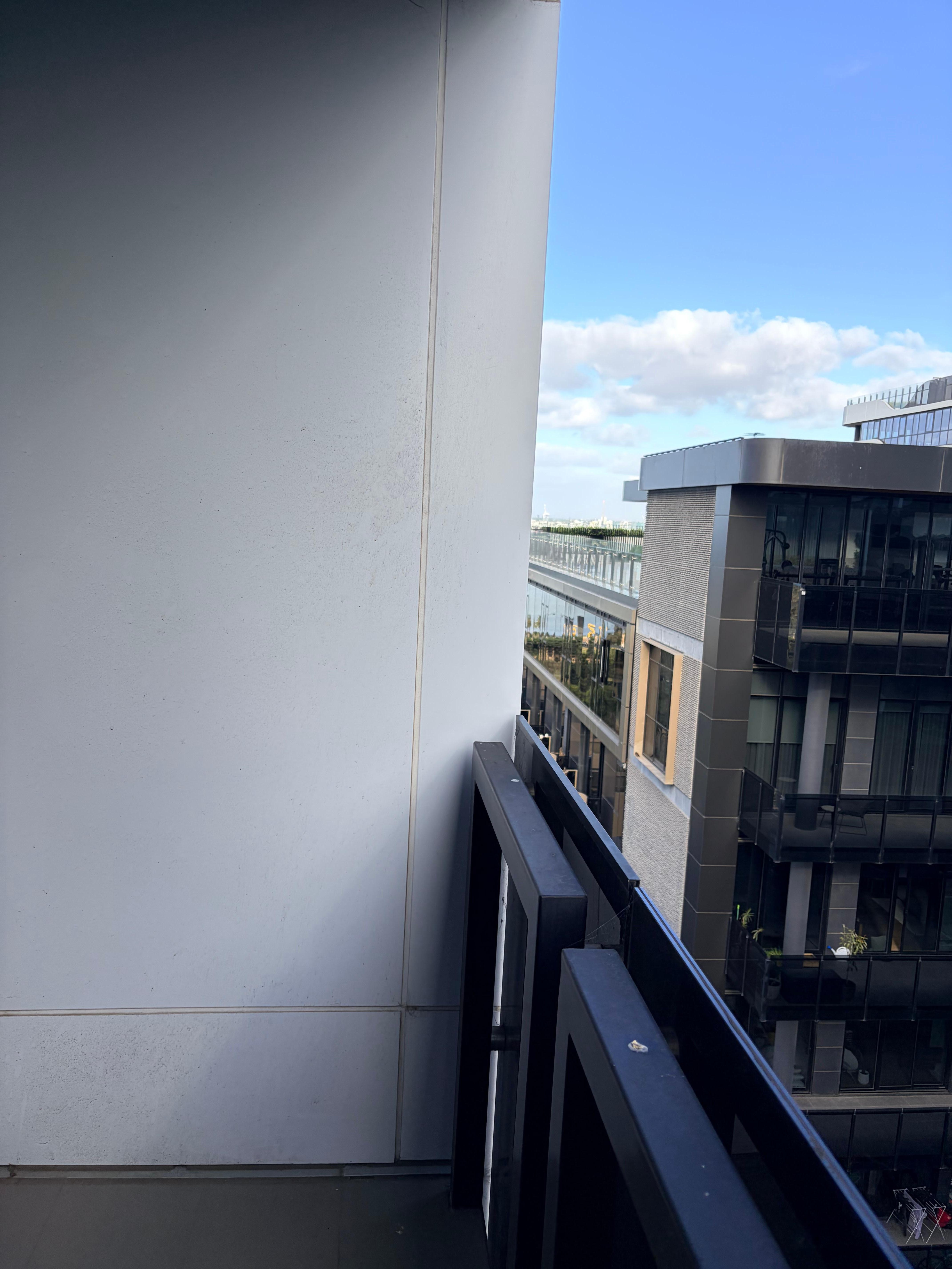 Bay view blocked by wall - photo taken on the balcony. 