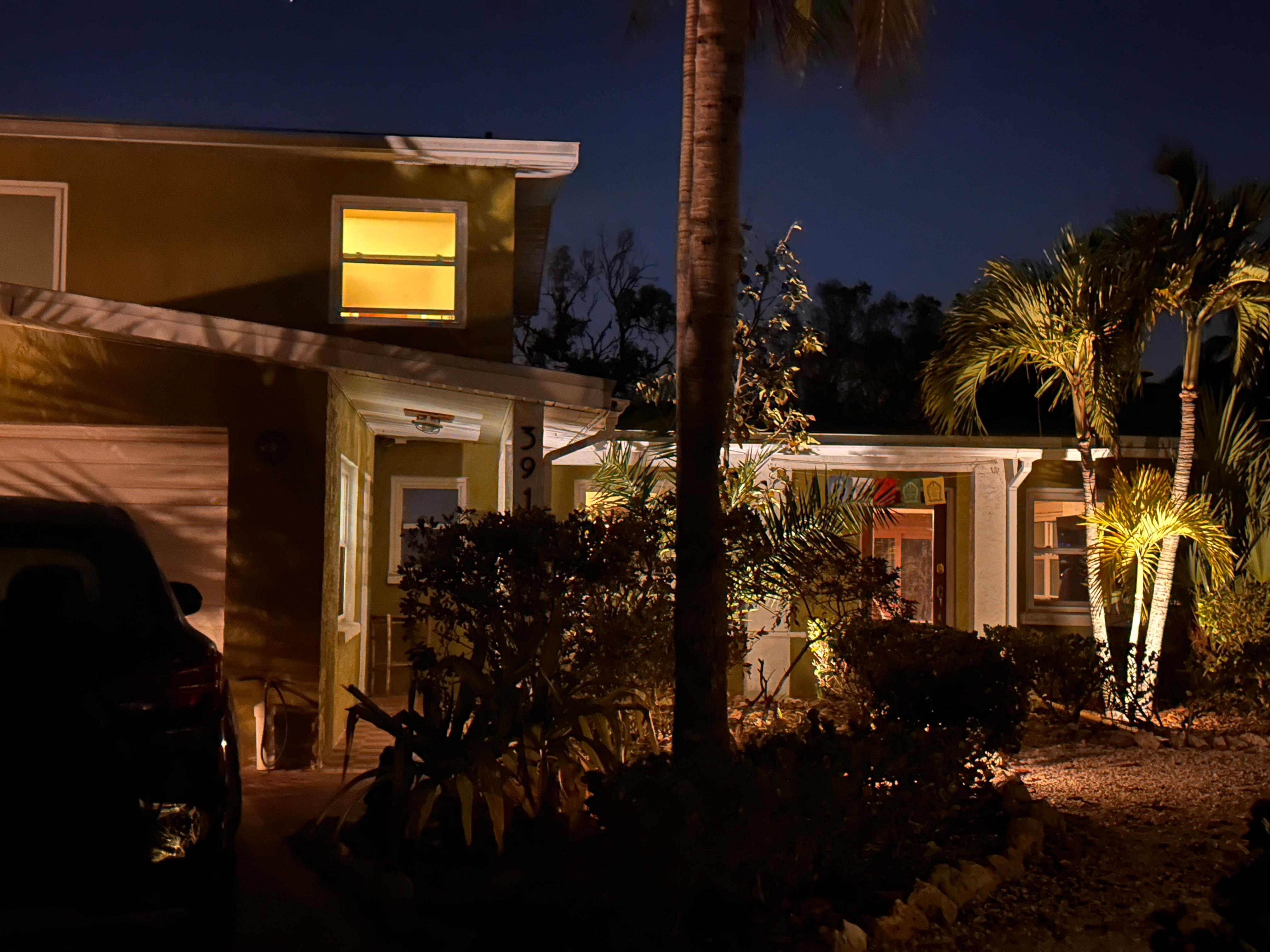 After an evening stroll, welcomed back by beautiful landscaping.