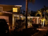 After an evening stroll, welcomed back by beautiful landscaping.