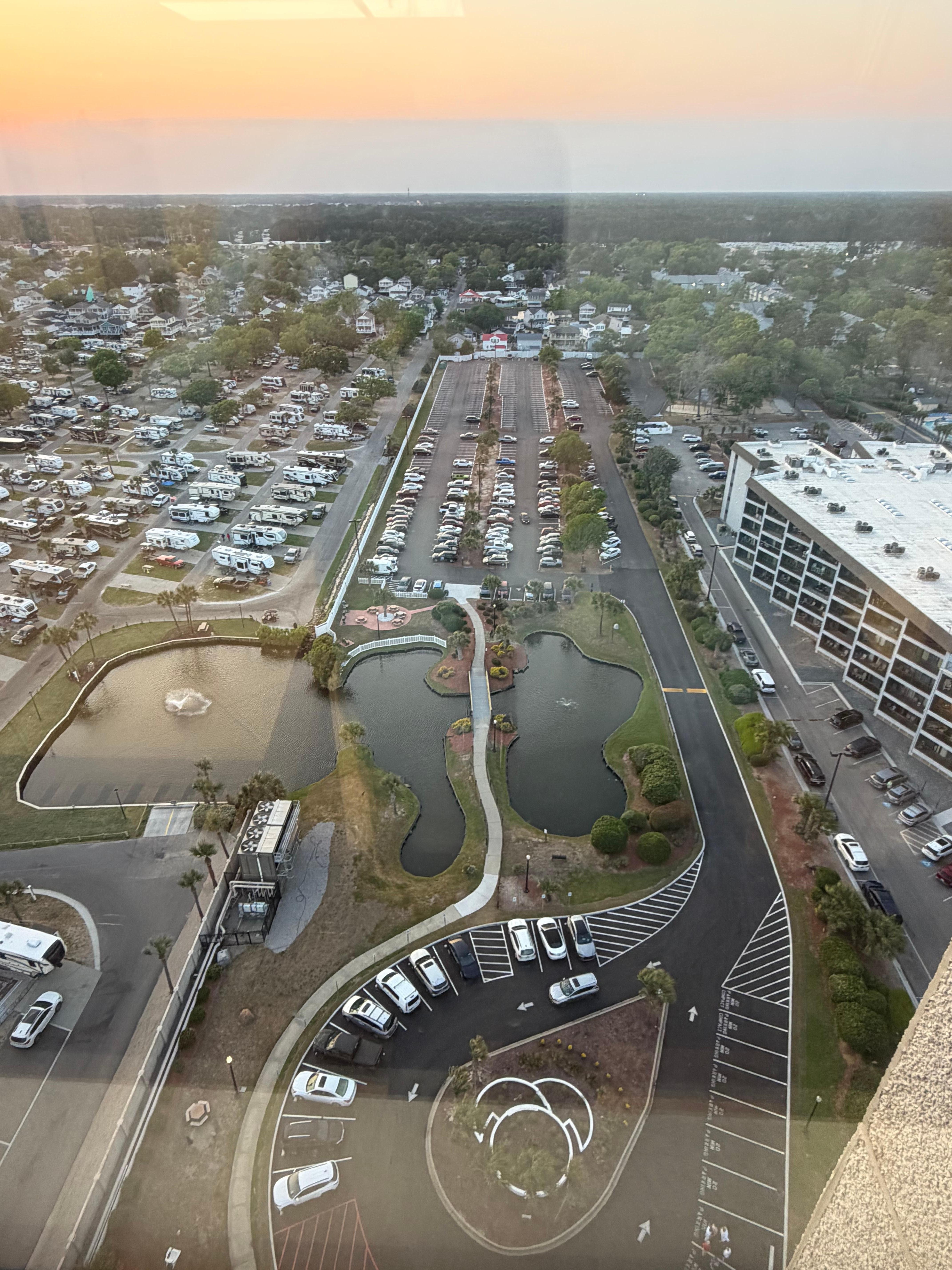 Handicap parking in the circle, never open. Other is over that bridge. 