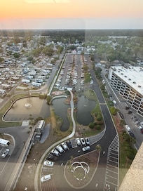 Handicap parking in the circle, never open. Other is over that bridge.