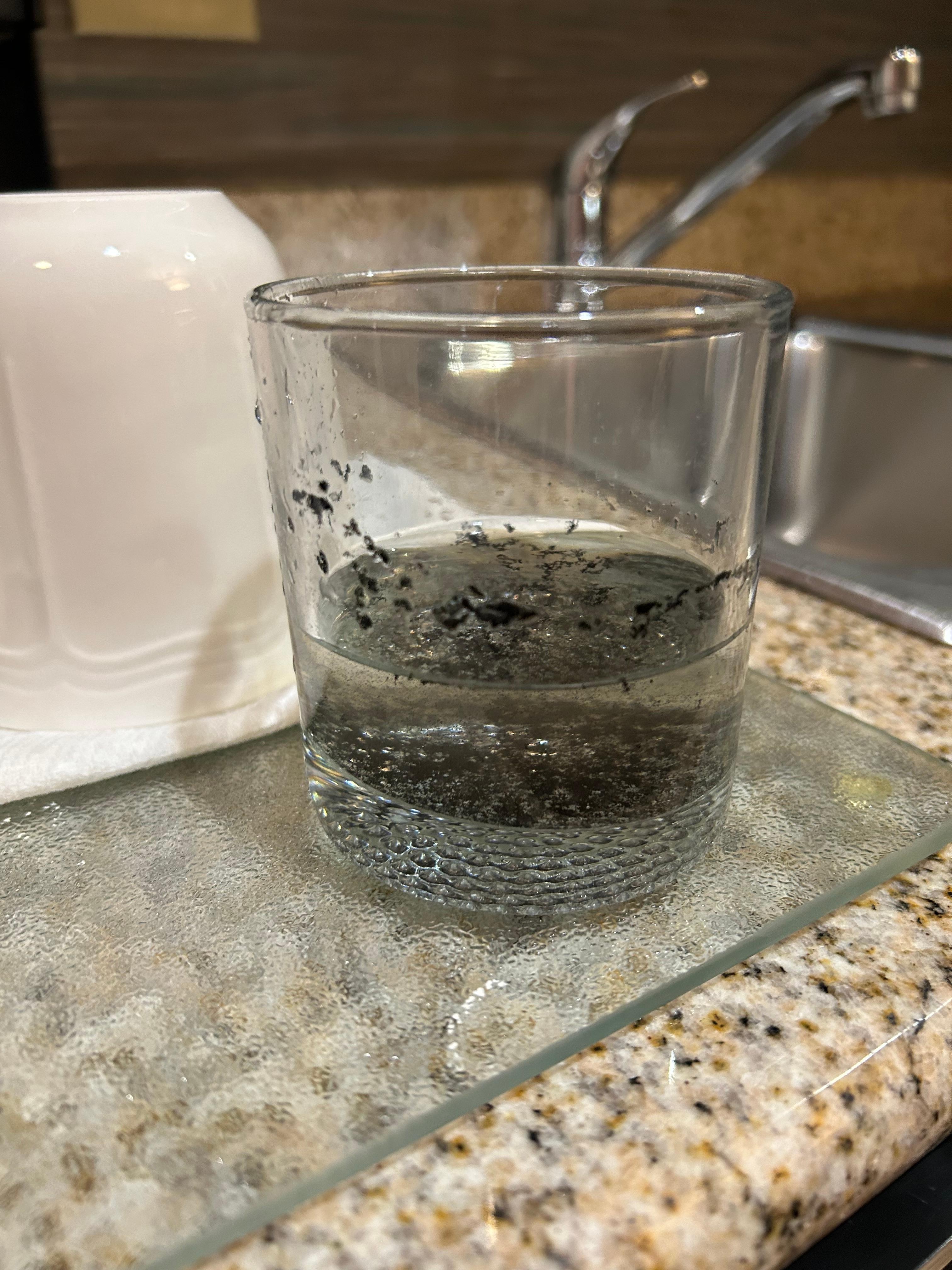 Water from the kitchen area faucet