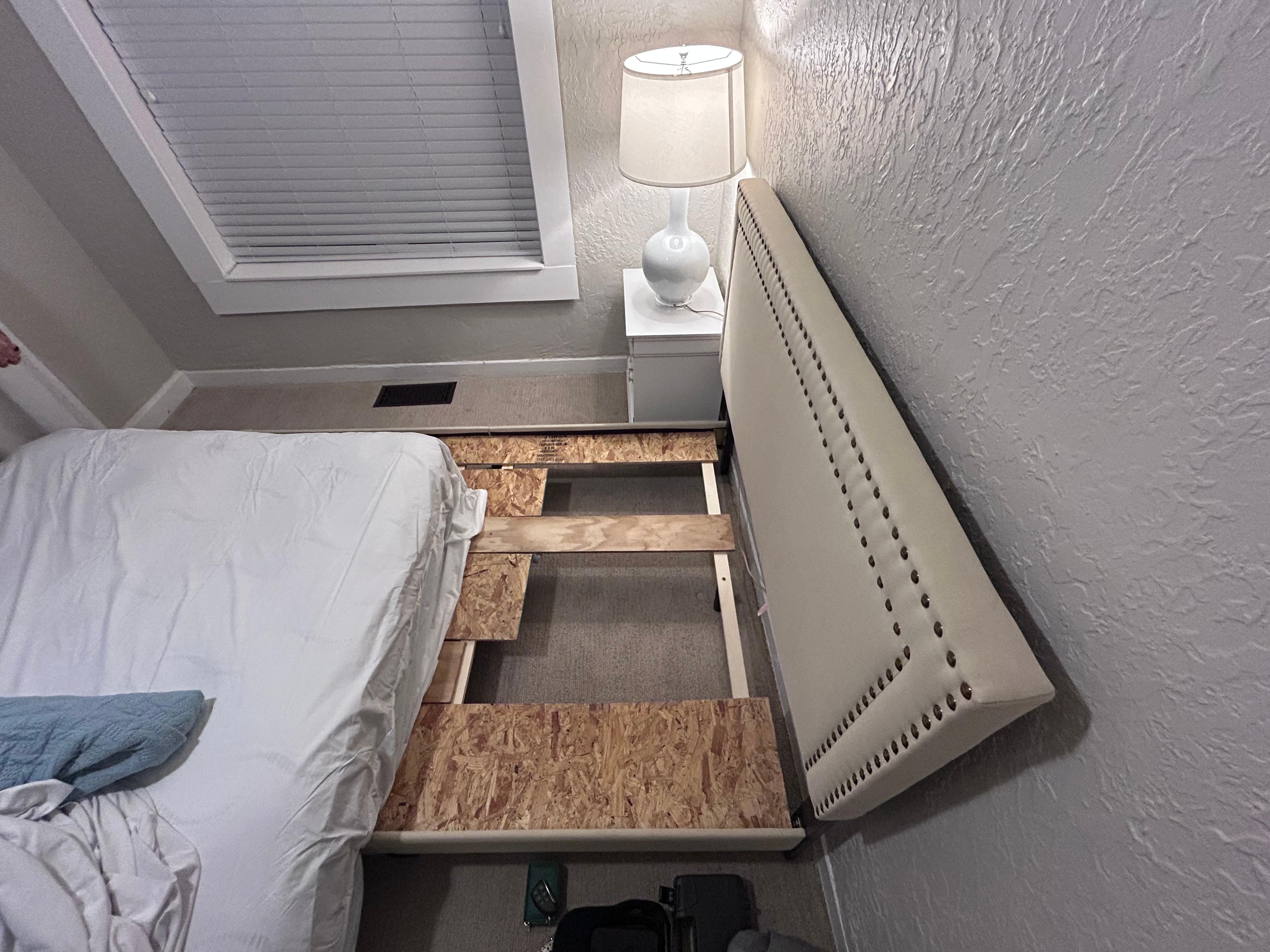 Random pieces of plywood under the mattress 
