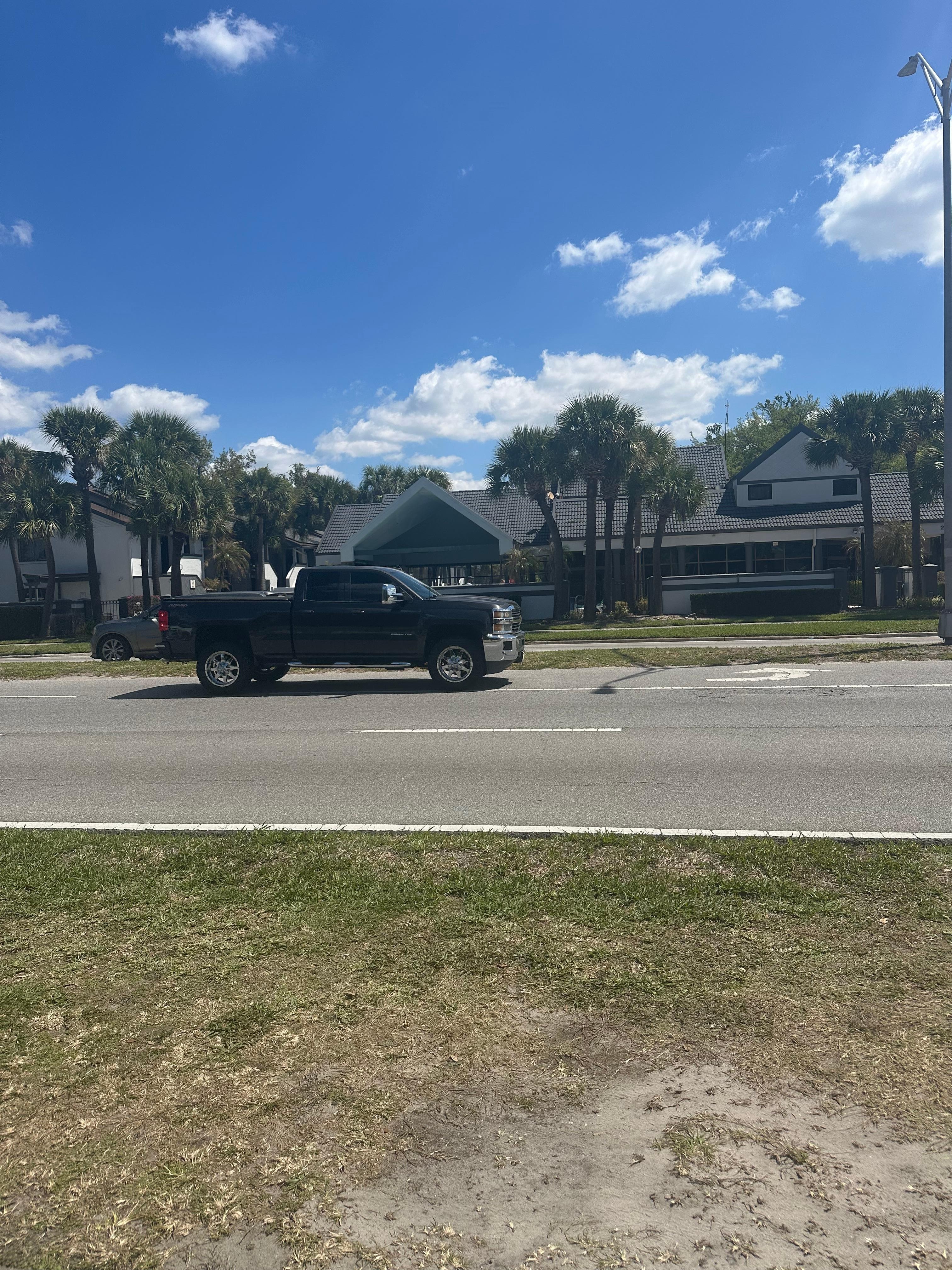 Busy highway to get out of parking lot. Pool pictured on Expedia is on the other side of the the highway. 